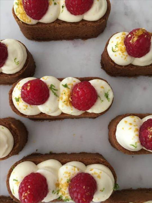 Almond Fingers with Lemon Icing and Raspberries