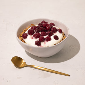 Orange Almond and Sultana Granola with Cherries and Yoghurt